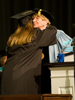 Dr. Pappalardo Hugging Student at Graduation Carroll Community College